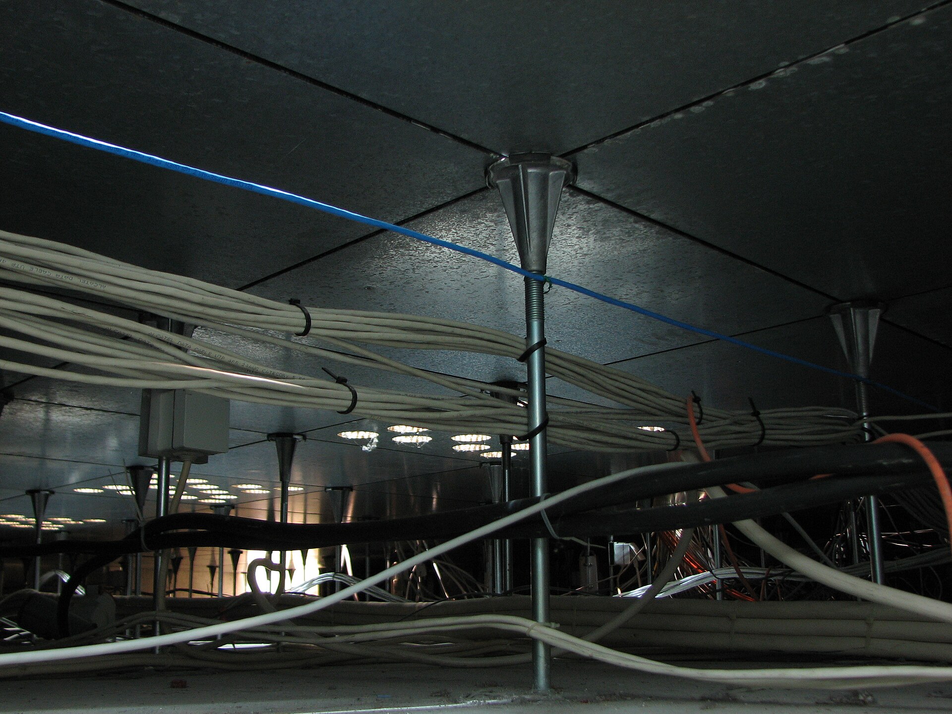 Under the raised floor of a data center, 2008.